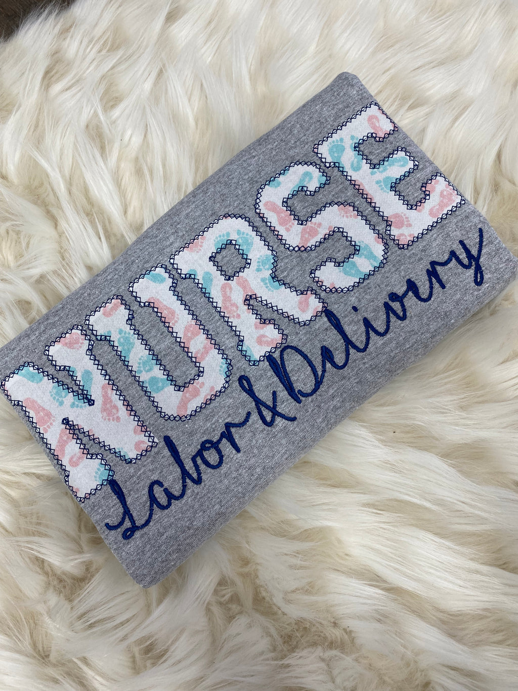 Labor and Delivery Nurse Embroidered Baby Feet Appliqué Sweatshirt