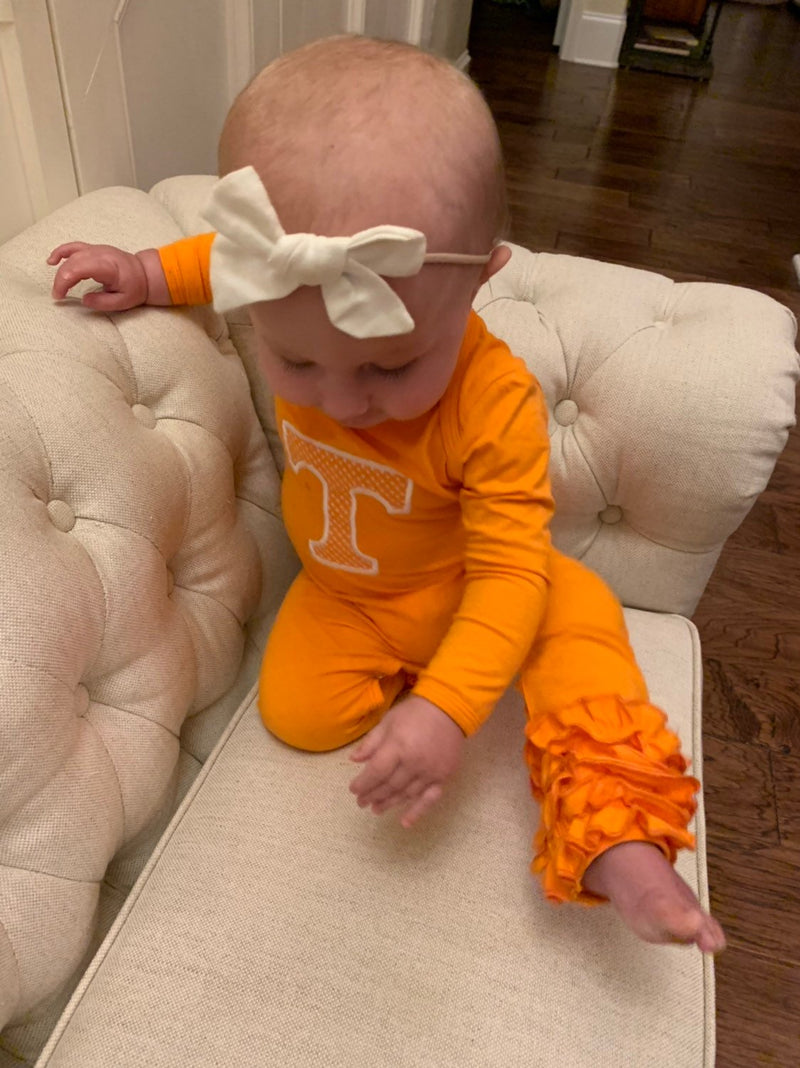 Baby girl in Power T Tennessee outfit