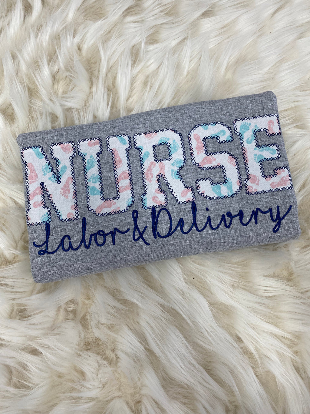 Labor and Delivery Nurse Embroidered Baby Feet Appliqué Sweatshirt